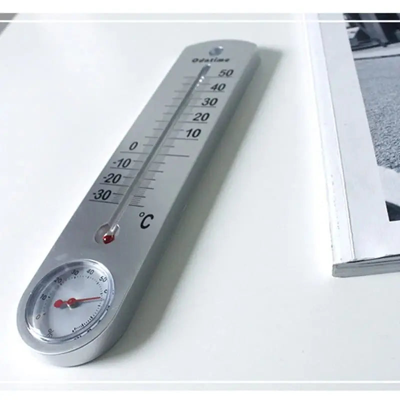 Photo de stock Thermomètre à mercure en verre cassé 1362297326